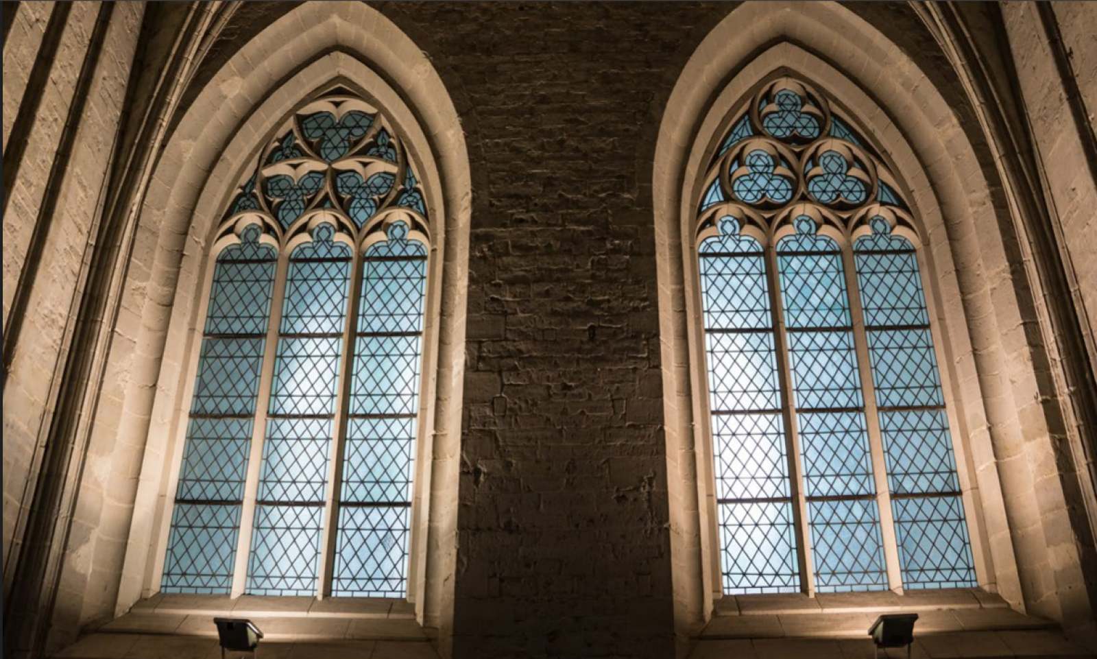 two gothic style church windows banner image