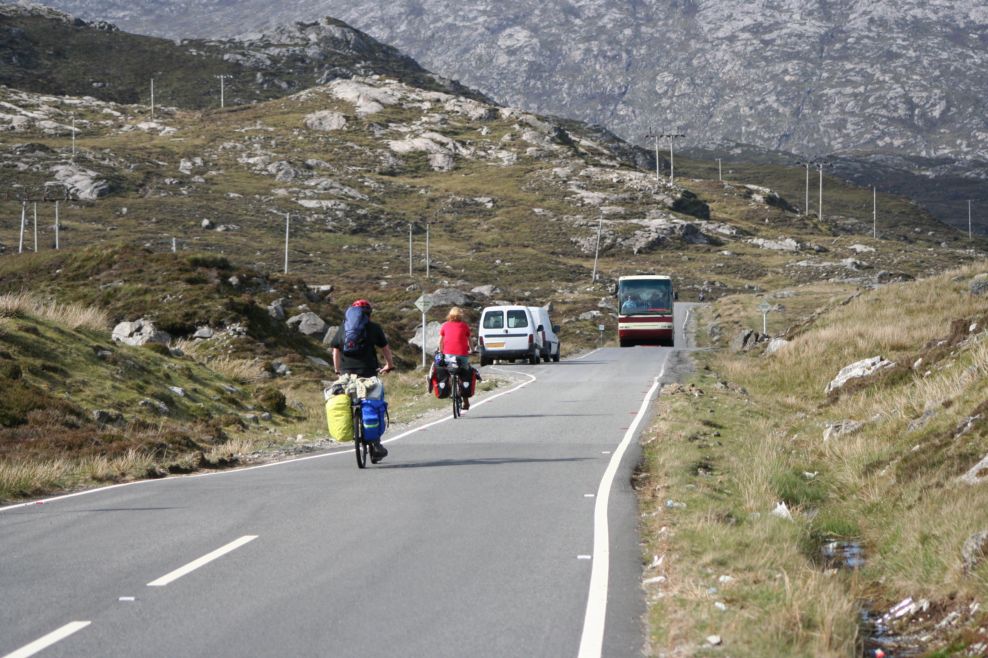 Cyclists on rural road in Scotland