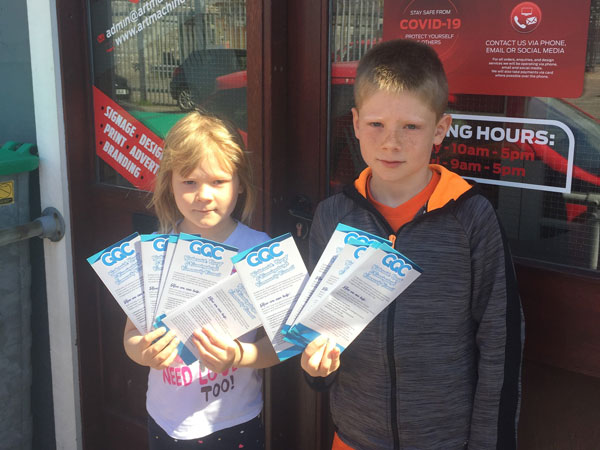 Katie (6) and Fraser Geddes (8) helped out with delivering leaflets provided by local company Art Machine Shetland.