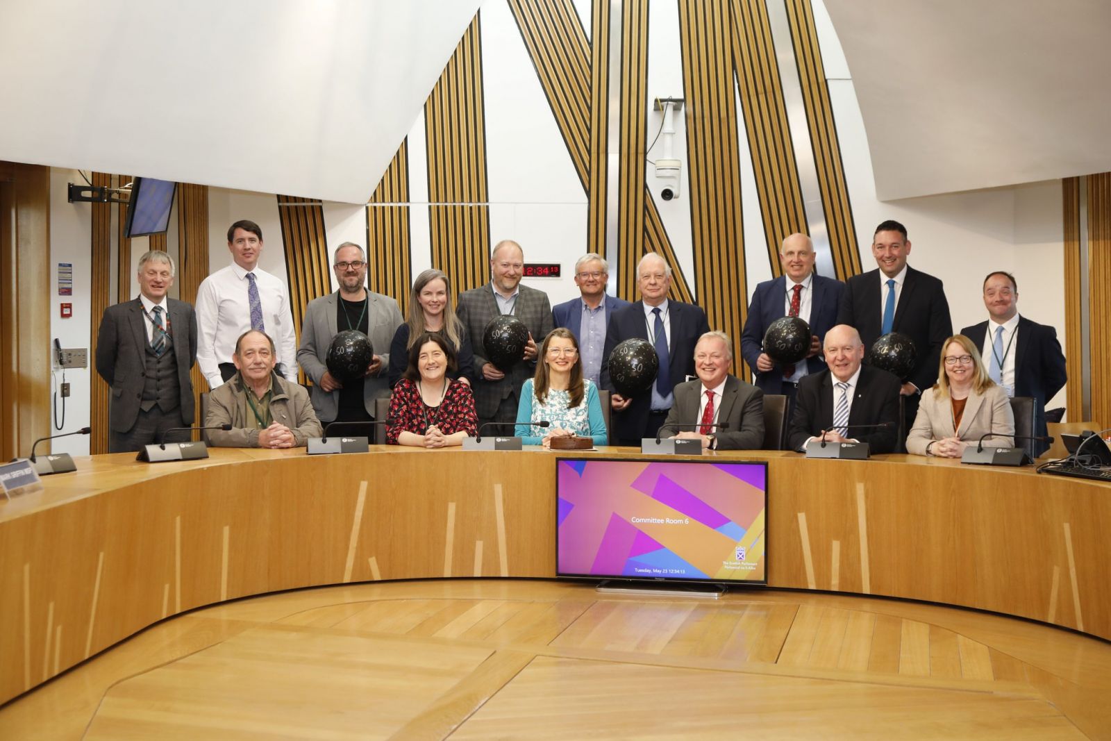 Local Government Committee MSPs and witnesses inside Scottish Parliament building banner image