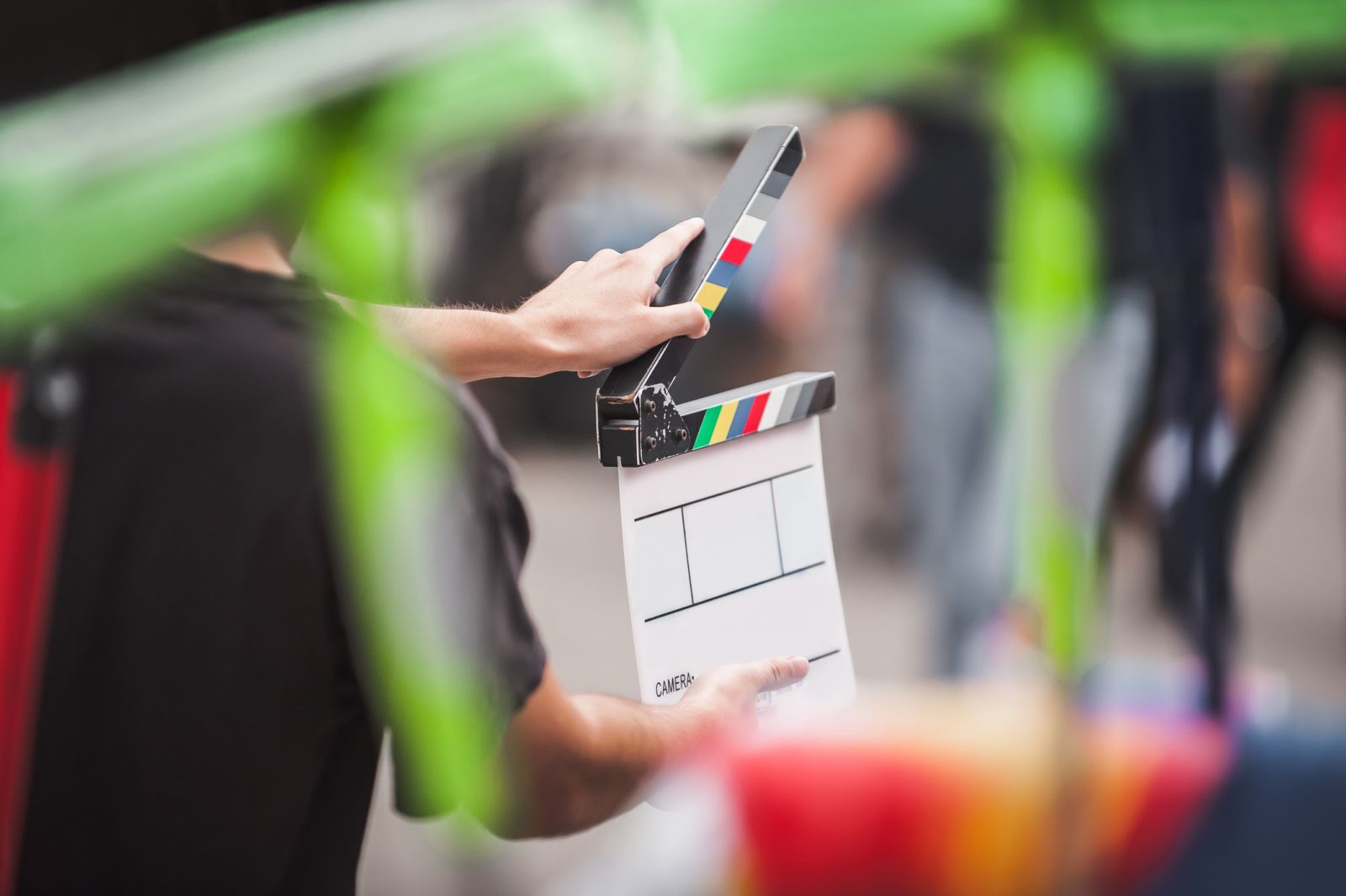 Filming clapboard in outdoor location banner image